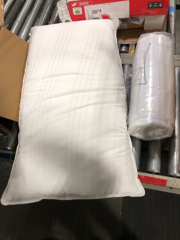 Photo 1 of 2 King sized pillows 