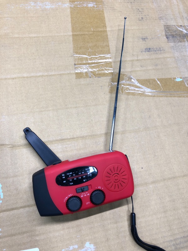 Photo 2 of RADIO WORKS, LIGHT WORKS, CRANK WORKS.
Emergency Hand Crank Radio with LED Flashlight for Emergency, AM/FM NOAA Portable Weather Radio with 2000mAh Power Bank Phone Charger, USB Charged & Solar Power for Camping, Emergency Red