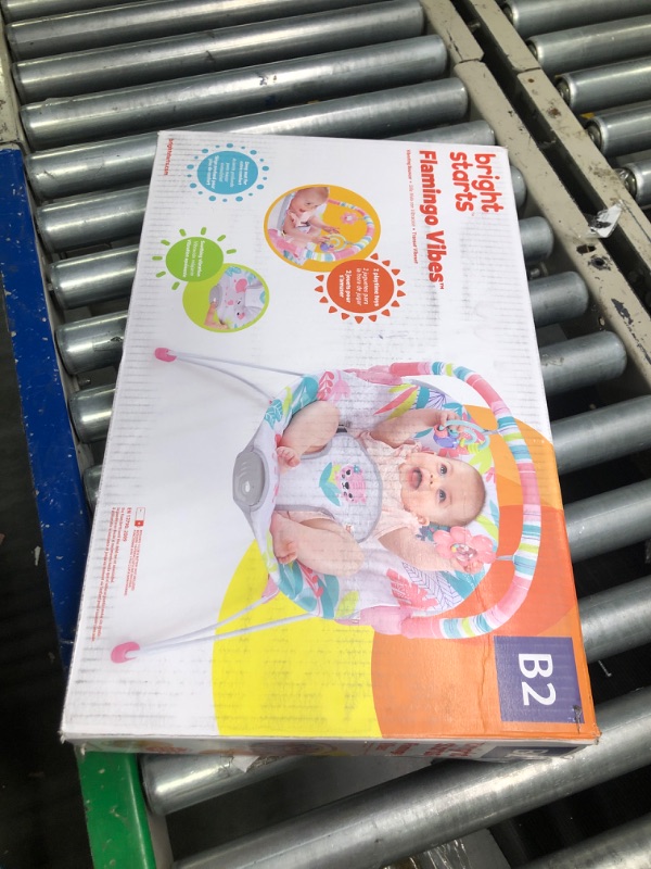 Photo 1 of Bright Starts Flamingo Vibes 3-Point Harness Harness Vibrating Baby Bouncer with -Toy bar