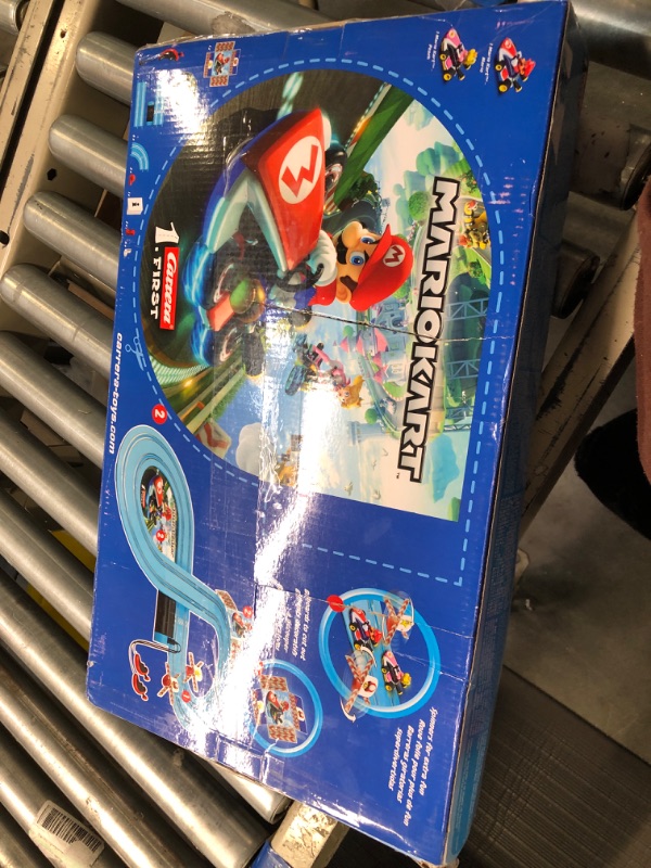 Photo 2 of Carrera First Mario Kart - Slot Car Race Track with Spinners - Includes 2 Cars: Mario and Peach - Battery-Powered Beginner Racing Set for Kids Ages 3 Years and Up Mario Kart w/ Peach