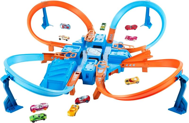 Photo 1 of Hot Wheels Track Set with 1:64 Scale Toy Car, 4 Intersections for Crashing, Powered by a Motorized Booster, Criss-Cross Crash Track (Amazon Exclusive)
