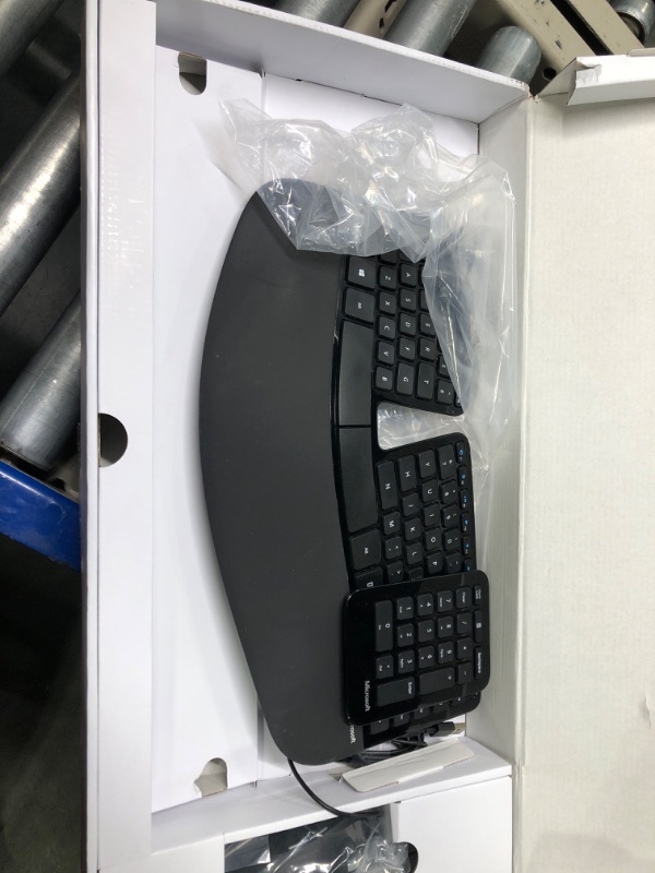 Photo 3 of Microsoft Ergonomic Desktop - Black - Wired, Comfortable, Ergonomic Keyboard and Mouse Combo, with Cushioned Wrist and Palm Support. Split Keyboard. Dedicated Office Key.