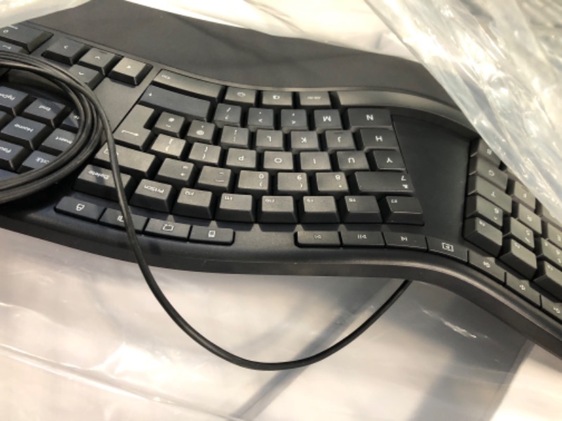 Photo 2 of Microsoft Ergonomic Desktop - Black - Wired, Comfortable, Ergonomic Keyboard and Mouse Combo, with Cushioned Wrist and Palm Support. Split Keyboard. Dedicated Office Key.