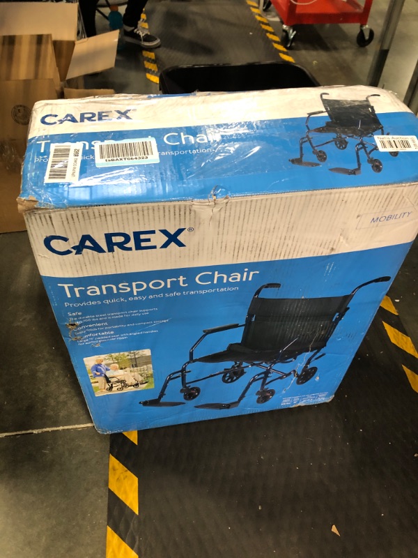 Photo 1 of Carex Transport Wheelchair With 19 inch Seat - Folding Transport Chair with Foot Rests - Foldable Wheel Chair for Travel and Storage, 1 Count