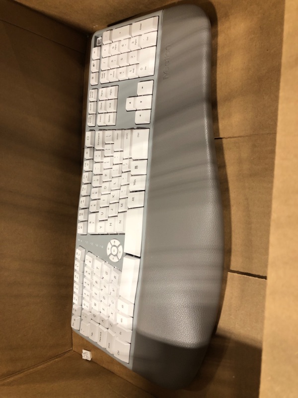 Photo 3 of MEETION Ergonomic Keyboard, Split Wireless Keyboard with Cushioned Wrist, Palm Rest, Curved, Natural Typing Full Size Rechargeable Keyboard with USB-C Adapter for PC/Computer/Laptop/Windows/Mac, Gray Gray White

**MISSING CORDS TO TEST ITEM**