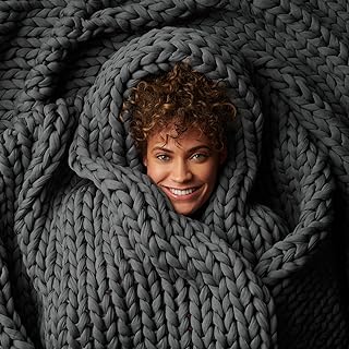 Photo 1 of  Hand-Knit Weighted Blanket for Adults - Chunky Knit Blanket - Sustainable, Breathable, Organic - Machine Washable for Easy Maintenance (Asteroid Grey, 15 lbs