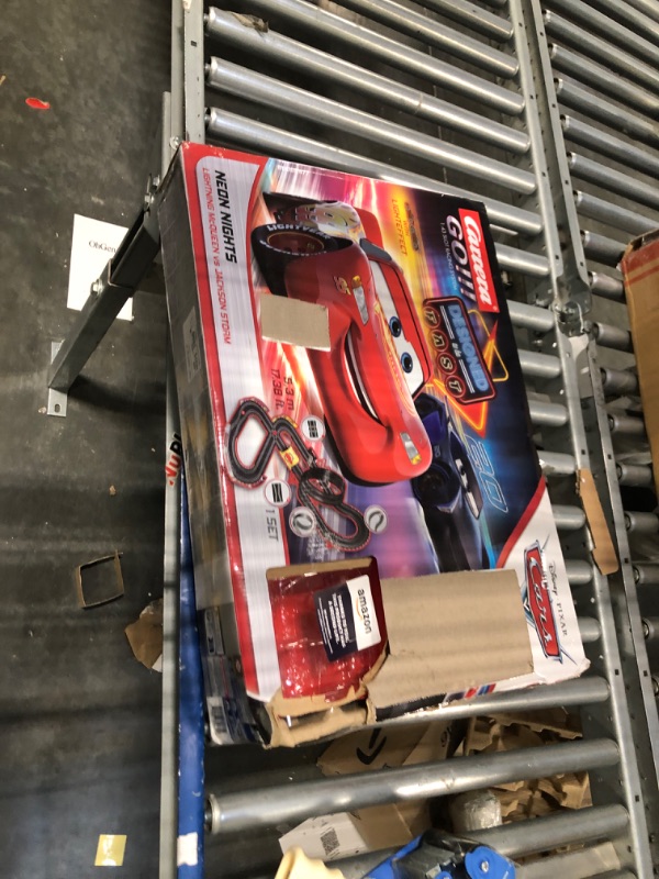 Photo 2 of Carrera GO!!! 62477 Disney Pixar Cars Neon Nights Electric Slot Car Racing Kids Toy Race Track Set Includes 2 Controllers and 2 Cars in 1:43 Scale Disney Cars Neon