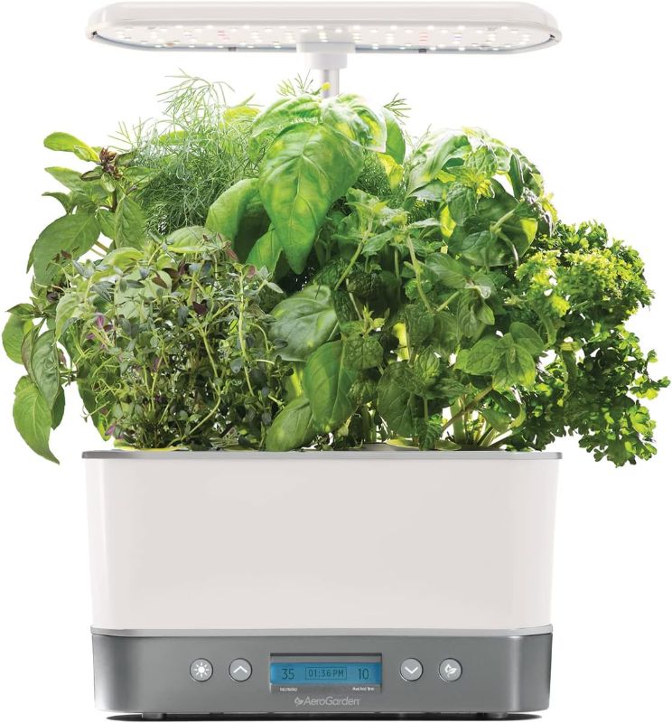 Photo 1 of 
AeroGarden Harvest Elite Indoor Garden Hydroponic System with LED Grow Light and Herb Kit, Holds up to 6 Pods, White