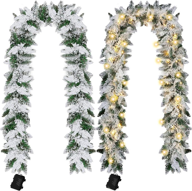 Photo 1 of ******LIGHTS DOES NOT LIGHT UP******Craftsatin 2 Pcs 9ft Pre Lit Snow Flocked Christmas Garland with 100 Warm White LED Lights Battery Operated with Timer and 8 Functions Xmas Decorations Xmas Garlands Indoor Outdoor Front Door Decor