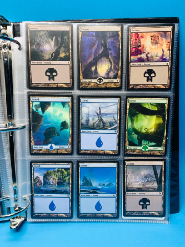 Photo 1 of 150017…144 misc magic the gathering cards in binder 