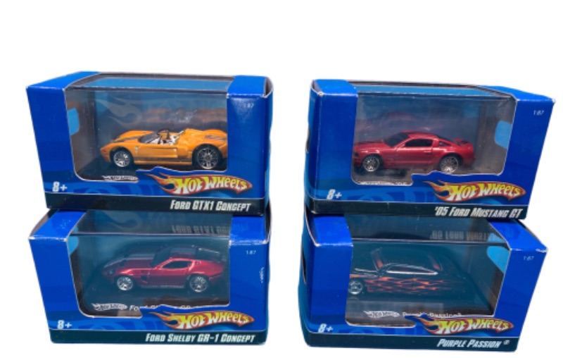 Photo 1 of 150018…4 hot wheels die cast cars in boxes 
