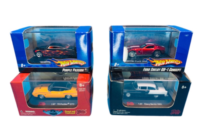 Photo 1 of 150019…4 die cast cars in boxes