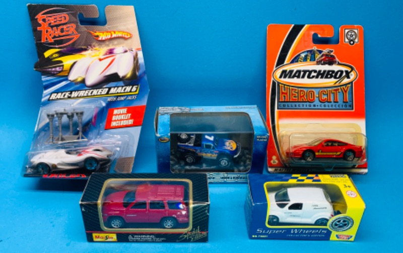 Photo 1 of 150025…5 die cast cars