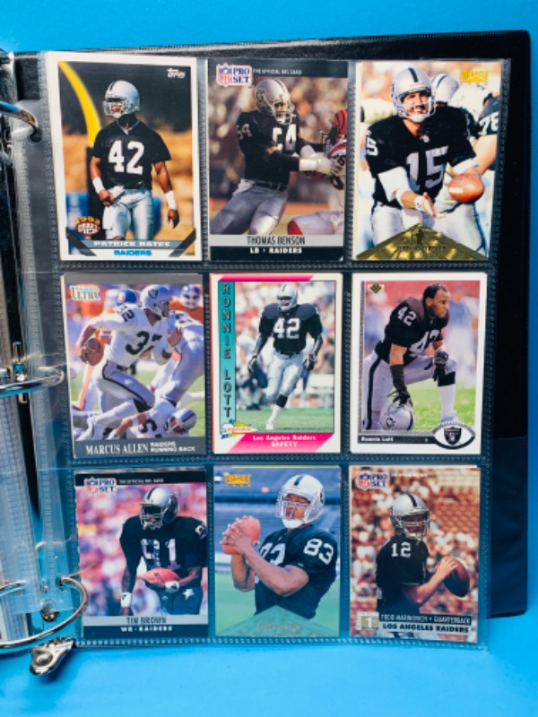 Photo 2 of 150039…90 misc Raiders trading cards in binder