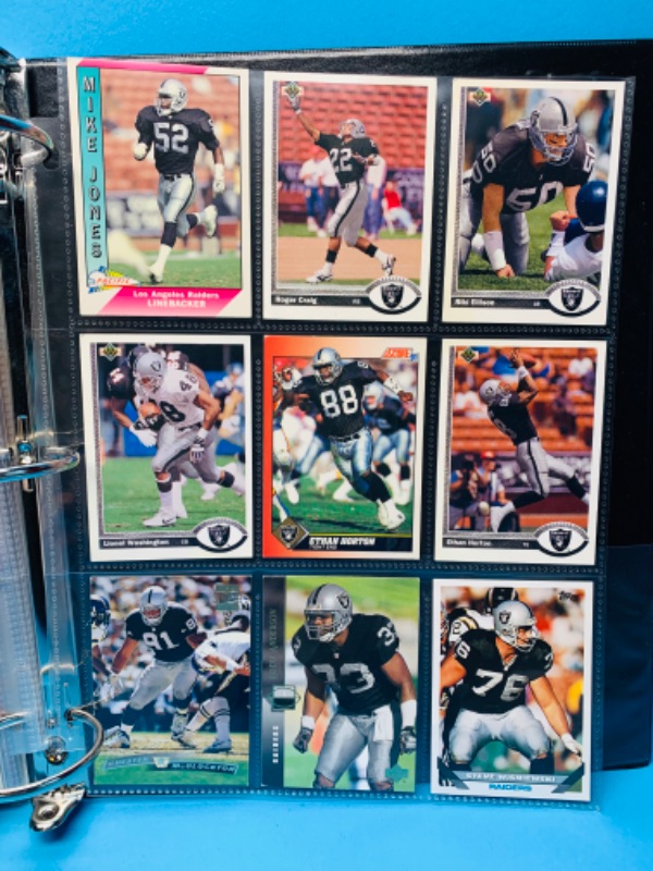 Photo 4 of 150039…90 misc Raiders trading cards in binder