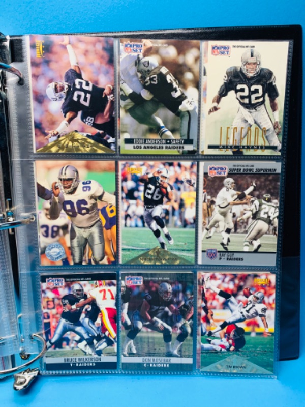 Photo 3 of 150039…90 misc Raiders trading cards in binder