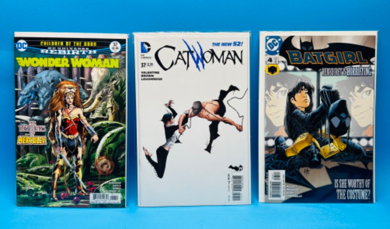 Photo 1 of 150118…3 female superhero comics in plastic sleeves