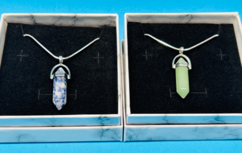 Photo 1 of 150208…2 crystal cut polished rock pendants on chains in gift boxes 