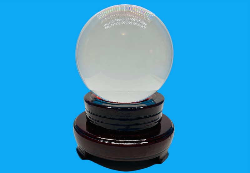 Photo 1 of 150412…clear 4” glass ball on wood stand 