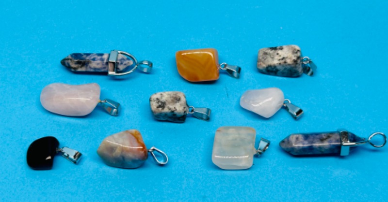 Photo 1 of 150444…10 polished rock pendants- no chains 