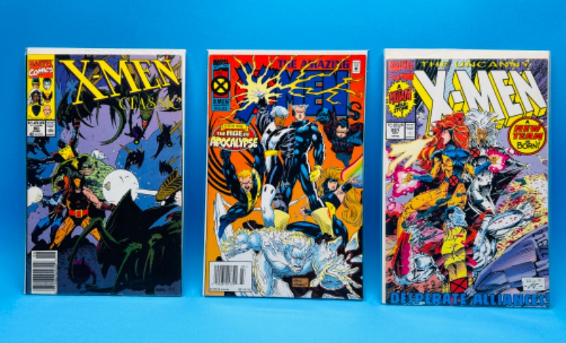 Photo 1 of 150623…3 older X-men  comics in plastic sleeves 