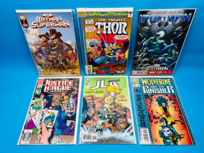 Photo 1 of 150627…6  comics in plastic sleeves 