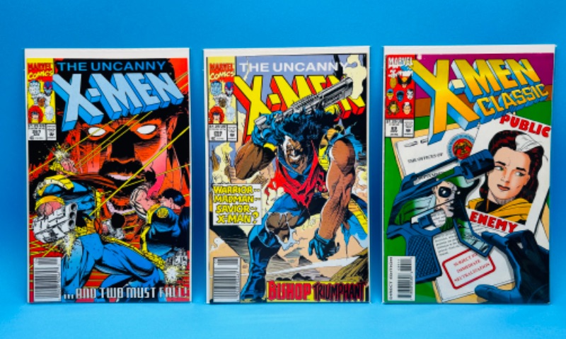 Photo 1 of 150631…3 older  X-men comics in plastic sleeves 