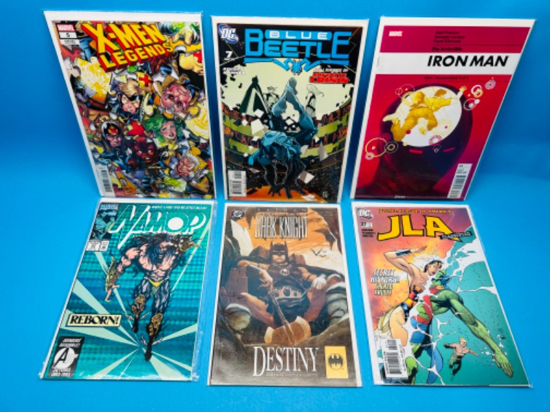 Photo 1 of 150633…6  comics in plastic sleeves 