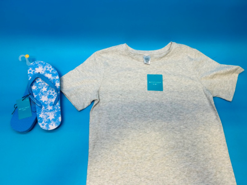 Photo 1 of 150950…kids size L t-shirt and flip flops