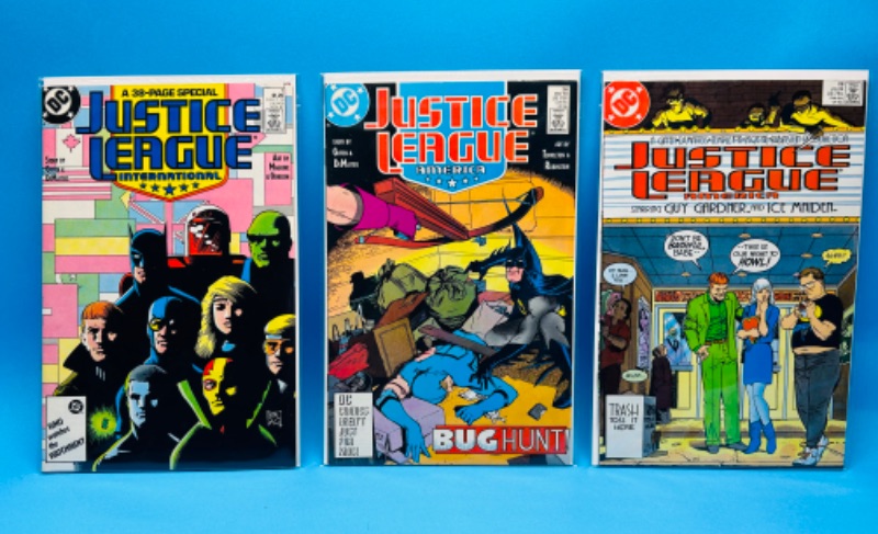 Photo 1 of 151001…3 vintage justice league  comics in plastic sleeves 
