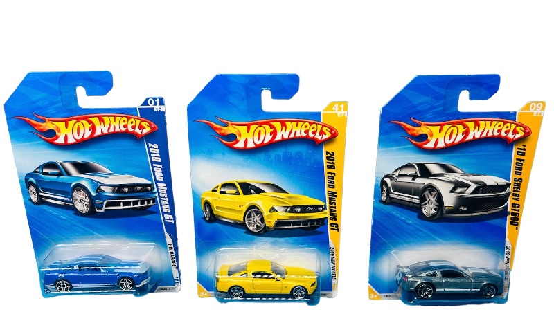 Photo 1 of 151055… 3 hot wheels die cast Ford Mustang  cars