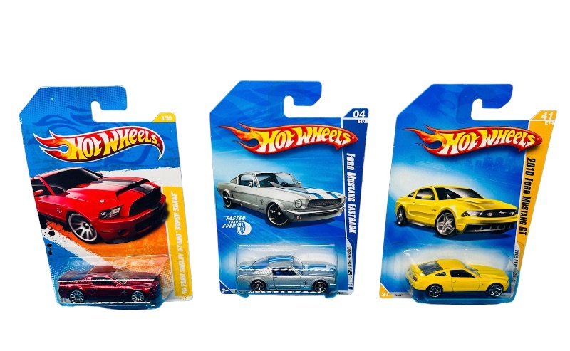 Photo 1 of 151056… 3 hot wheels die cast Ford  Mustang cars