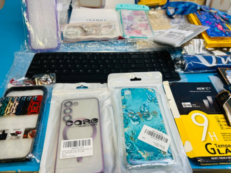 Photo 6 of 151104…various cel phone cases, glass protectors, and more