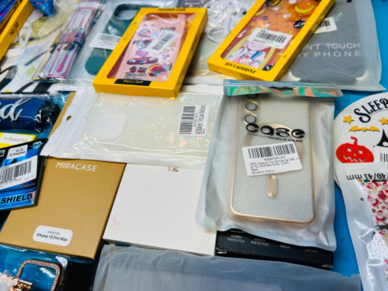 Photo 2 of 151104…various cel phone cases, glass protectors, and more