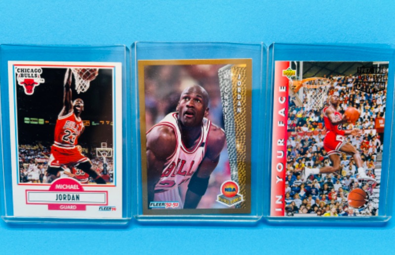 Photo 1 of 151157…3 Michael Jordan cards in hard plastic sleeves 