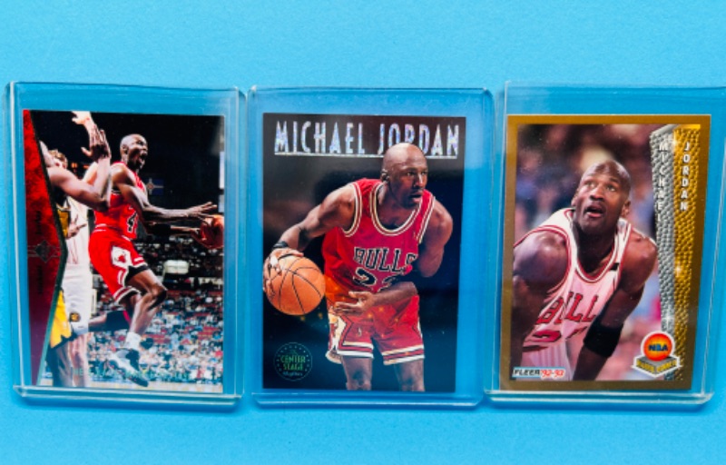 Photo 1 of 151158…3 Michael Jordan cards in hard plastic sleeves 