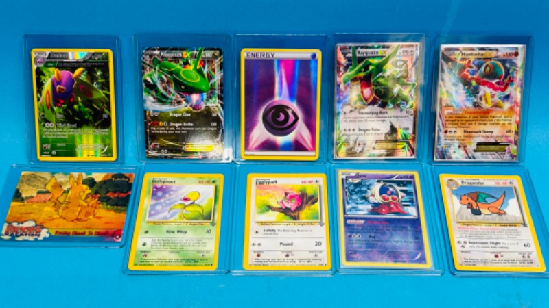 Photo 1 of 151218…Pokémon reverse, holo, and EX cards in hard plastic sleeves 