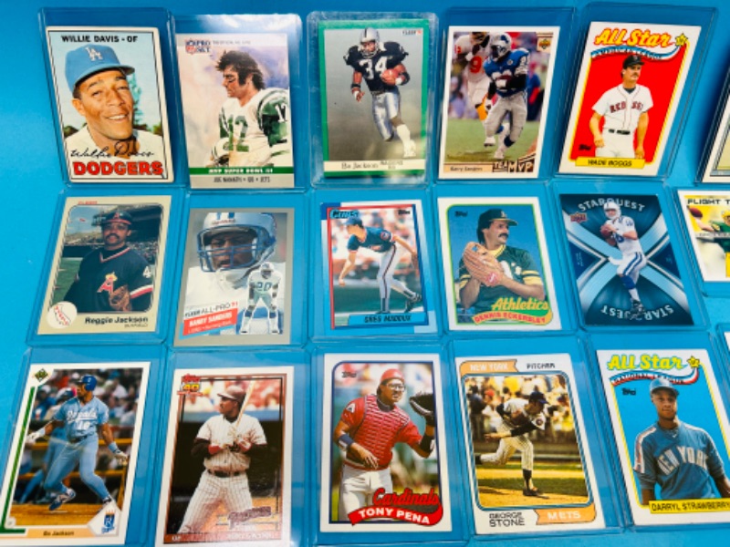 Photo 3 of 151219…18 collectible sport cards in plastic sleeves 