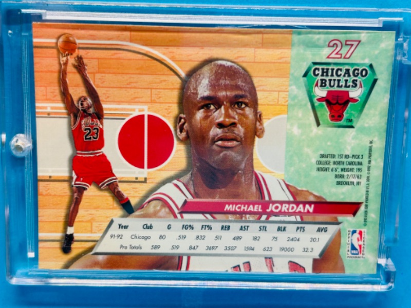 Photo 2 of 151227…Fleer Ultra Michael Jordan card 27 in hard plastic case 