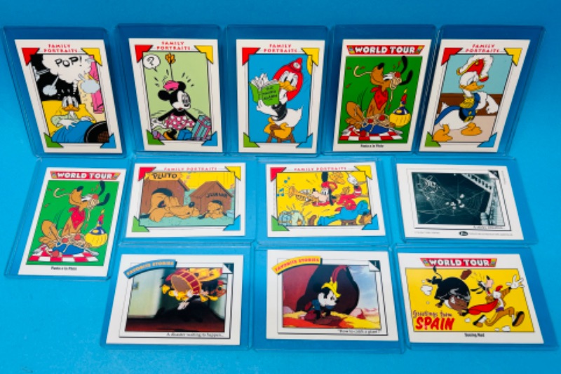 Photo 1 of 151250…12 Disney cards  in hard plastic sleeves 