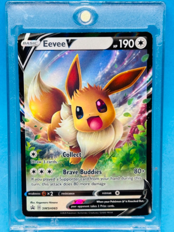 Photo 1 of 151310…Pokémon Eevee V holo chrome card swsh065 in hard plastic case 