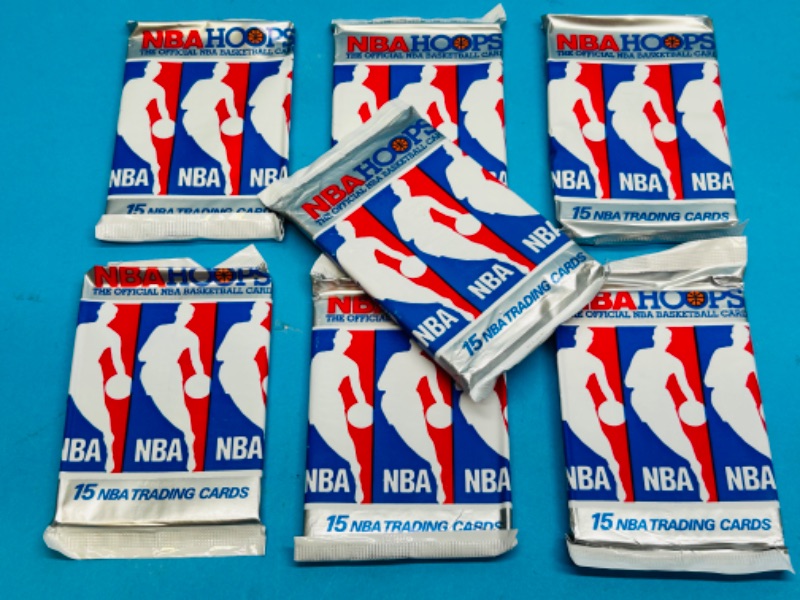 Photo 1 of 151332…7 sealed NBA Hoops trading card packs 