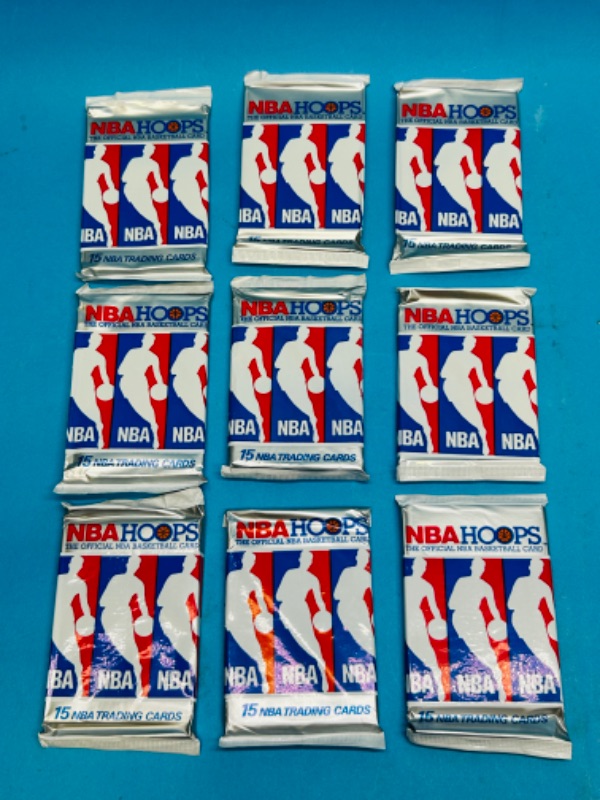 Photo 1 of 151333…9 sealed NBA Hoops trading card packs 