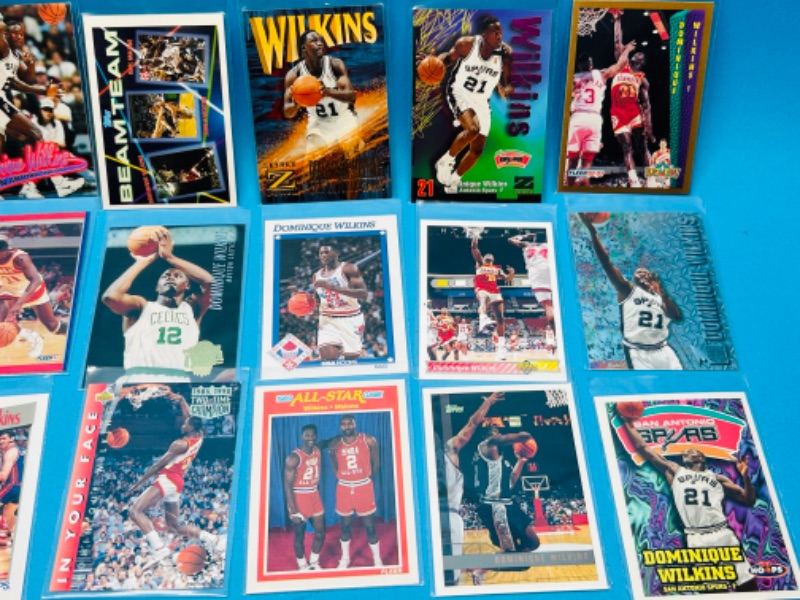 Photo 2 of 151427…18 Dominique Wilkins cards in plastic sleeves 