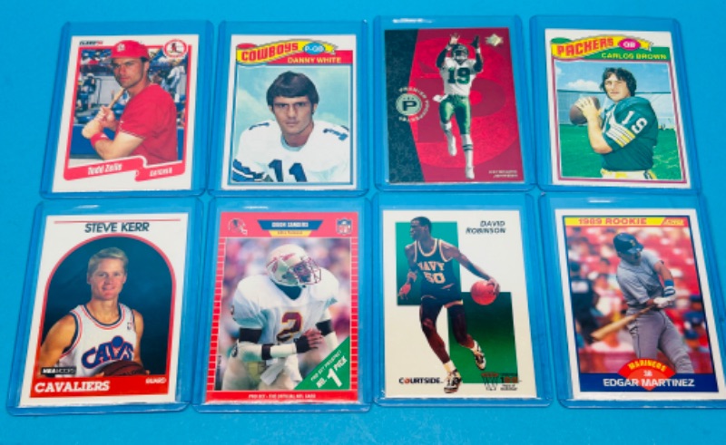 Photo 1 of 151435…8 sports rookie cards in hard plastic sleeves 