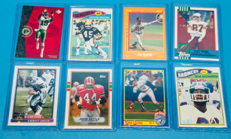 Photo 1 of 151436…8 sports  rookie cards in hard plastic sleeves 