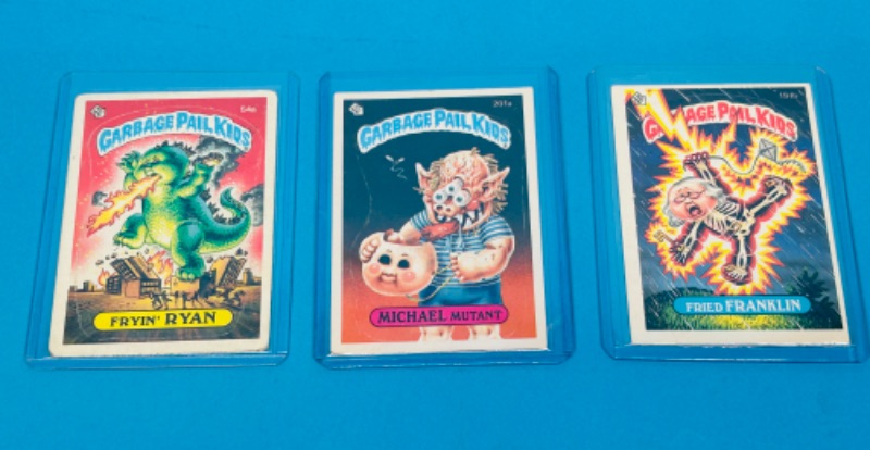 Photo 1 of 151549… 3 vintage garbage pail kids sticker cards in hard plastic sleeves  1986