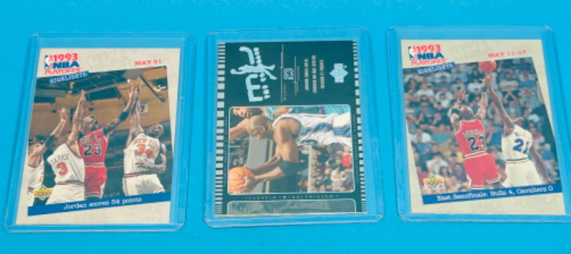 Photo 1 of 151570…3 Michael Jordan cards in hard plastic sleeves 