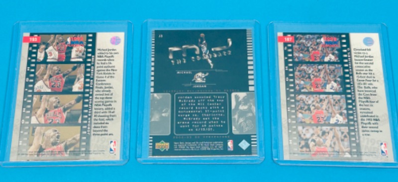 Photo 2 of 151570…3 Michael Jordan cards in hard plastic sleeves 