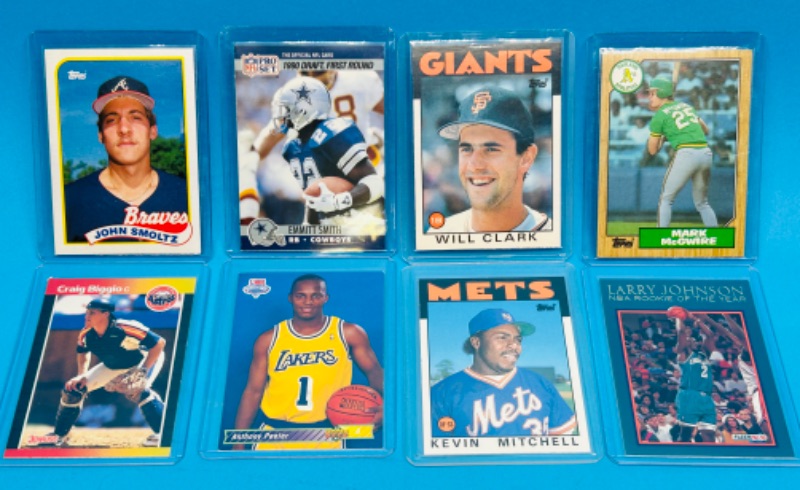 Photo 1 of 151579…8 Rookie sports cards in hard plastic sleeves 